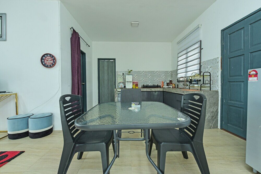 Фото Oyo Home 90682 Liliz Mambang Farmstay