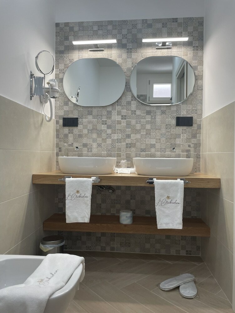 Фото B&b L'Orchidea