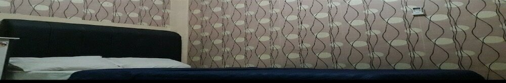 Фото Oyo 90706 Kost Alam Jaya Syariah