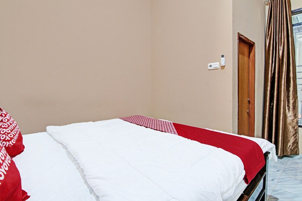Фото Oyo 92223 Alfatar Homestay Syariah