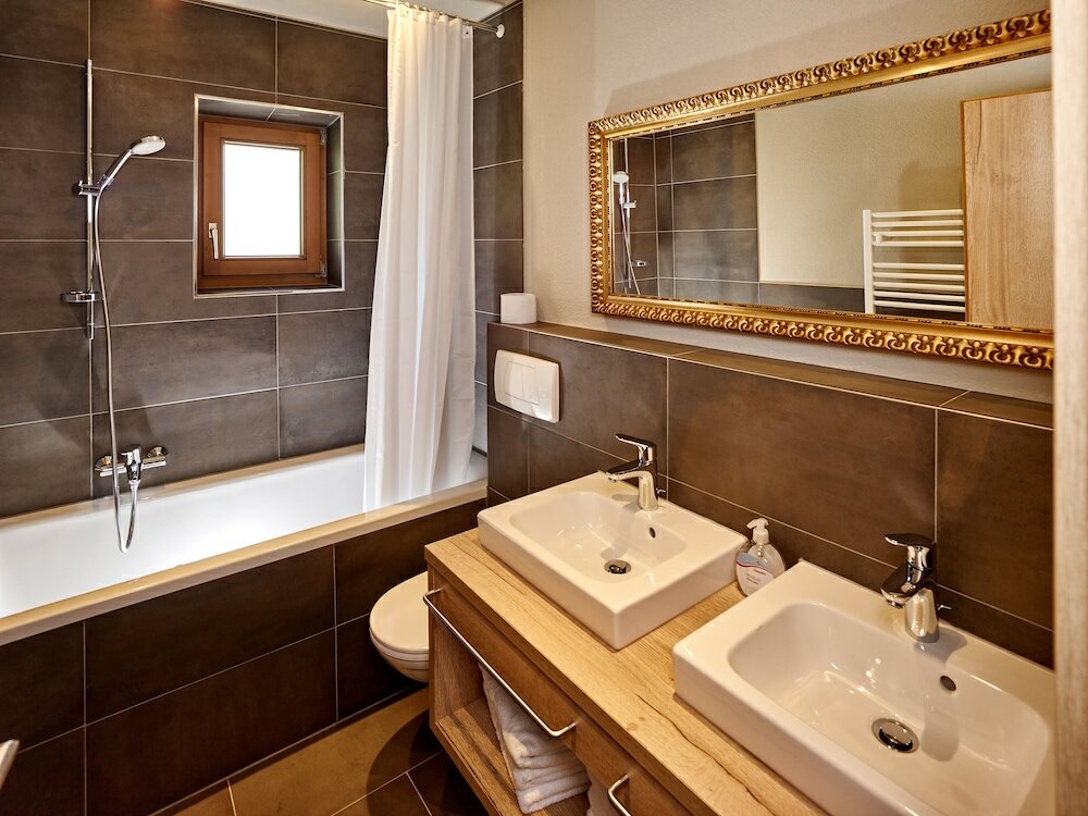 Фото A Casa Juwel - Ski in & Out Appartements