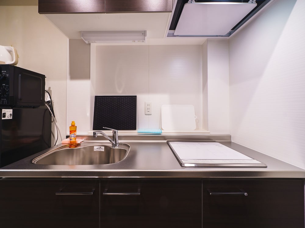 Фото Ikidane Residential Hotel Shimanouchi