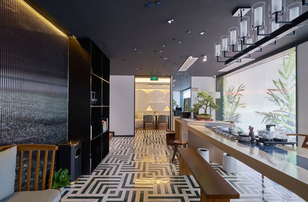 Фото Wuhua Xingxiang Shanfang Hotel