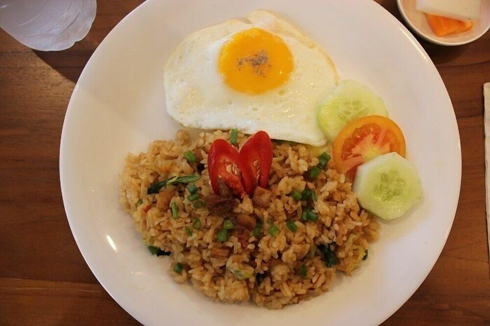 Фото The Sarining Hotel