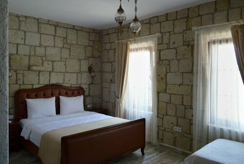 Гостиница Fehmi Bey Alacati Butik Otel - Special Class в Чешме