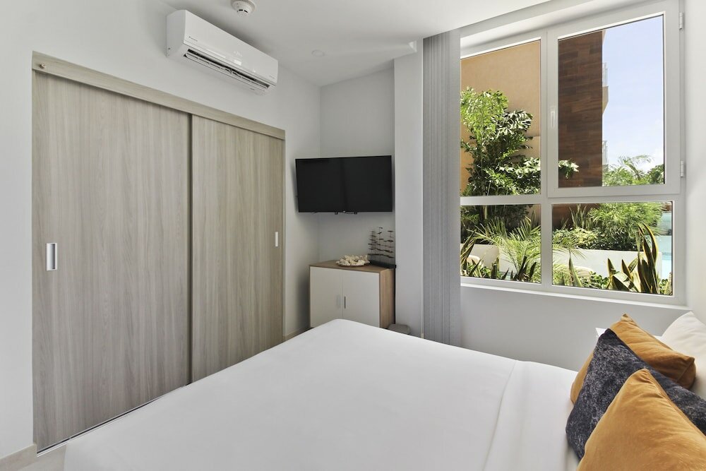 Фото Bocobay Aracari Condo Hotel