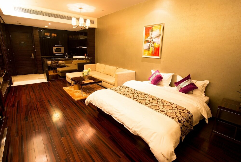 Фото Wanlong Apartment Pazhou Branch