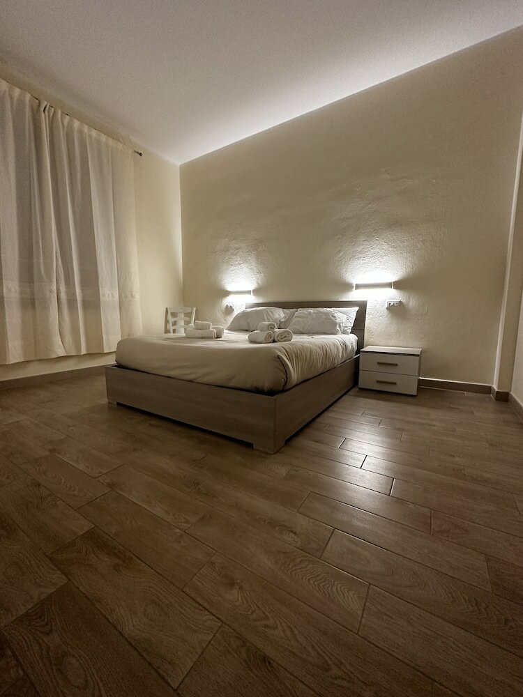 Фото Domo Achenza Guesthouse