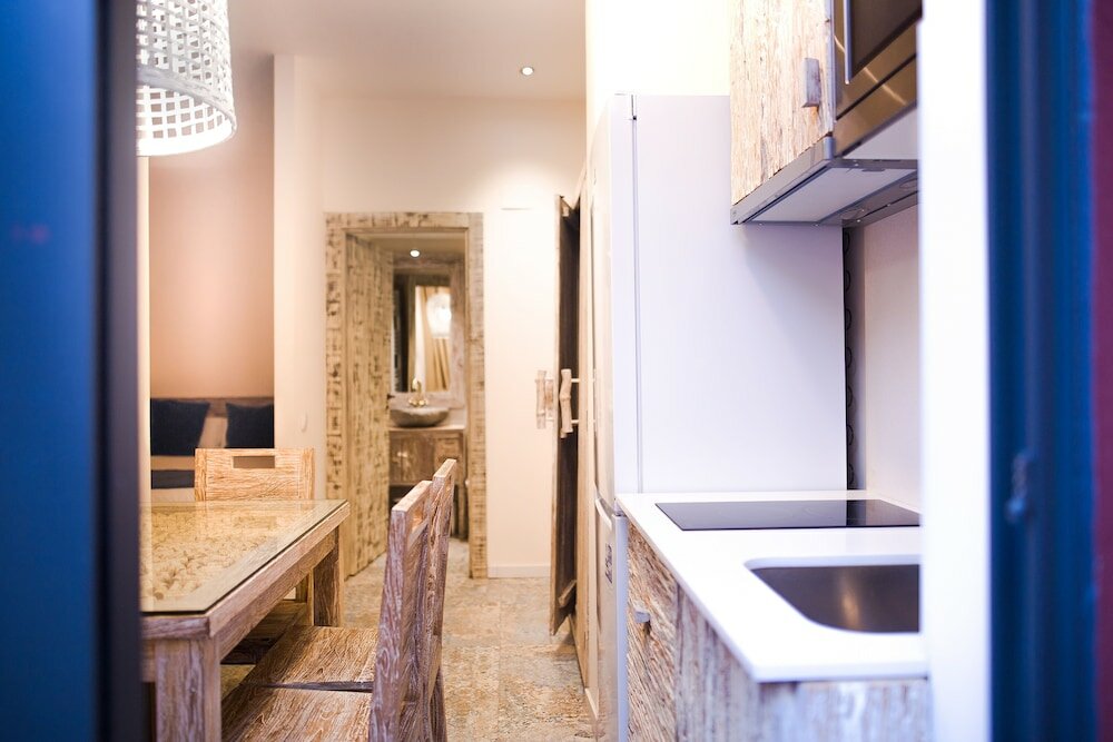 Фото La Bodega Suites