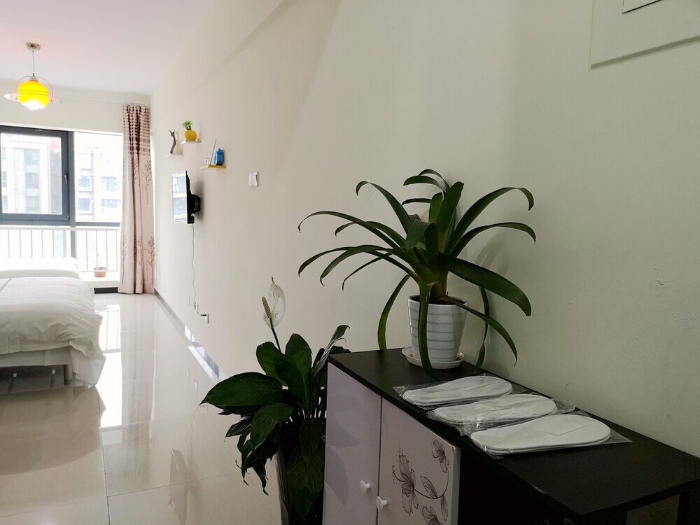 Фото Xiwangju Apart-hotel