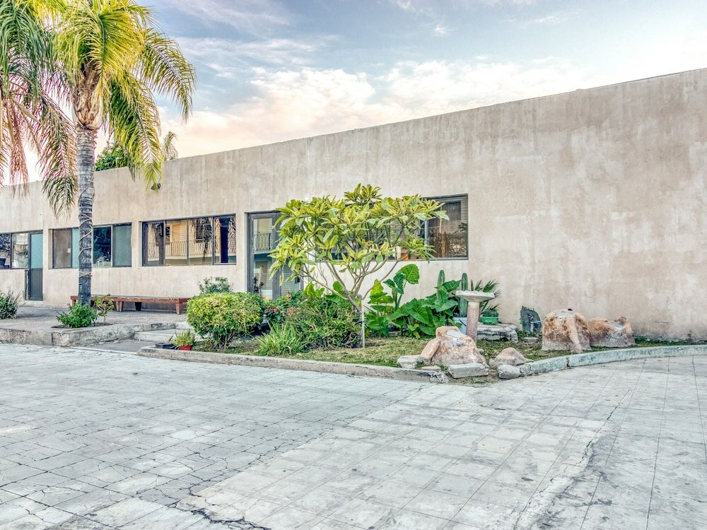 Фото Capital O Hotel La Siesta, Gómez Palacio