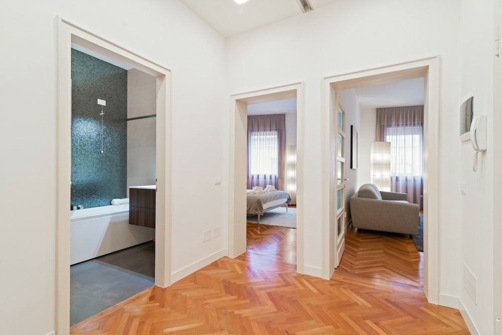 Фото San Fermo Luxury Apartment