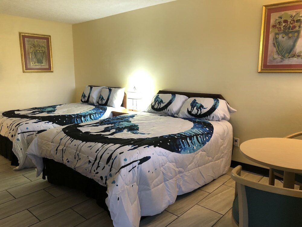 Фото Motel Boutique by Wolf Inn