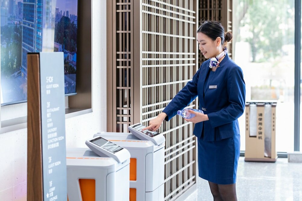 Фото Gz Baiyun Airport MeHood Liz Hotel T1