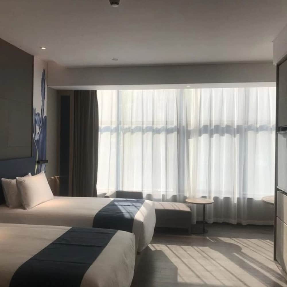 Фото Naive S Hotel