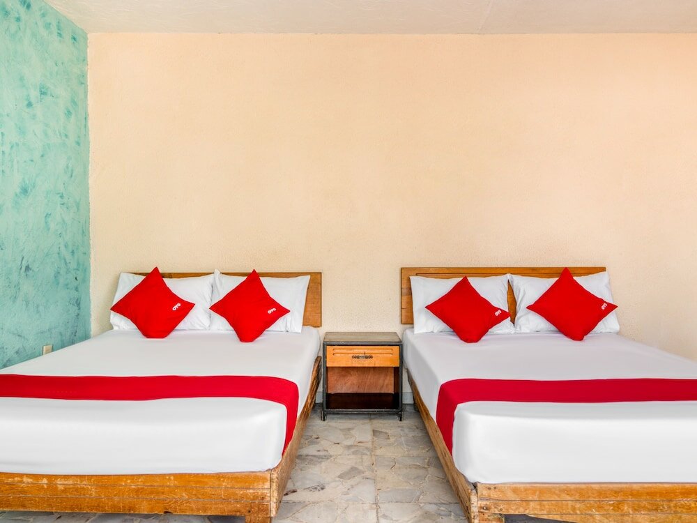 Фото Capital O Hotel La Siesta, Gómez Palacio