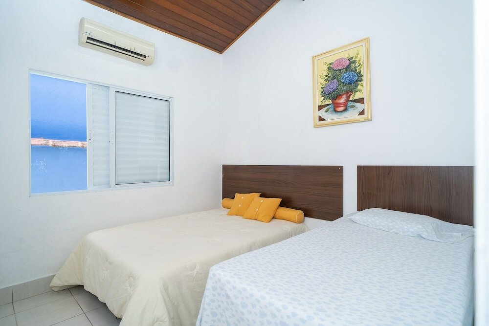 Фото Aconchegante casa em condomínio fechado com lazer completo