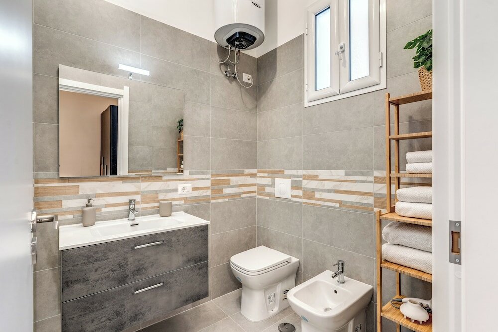 Фото The Quarters Naples Apartment