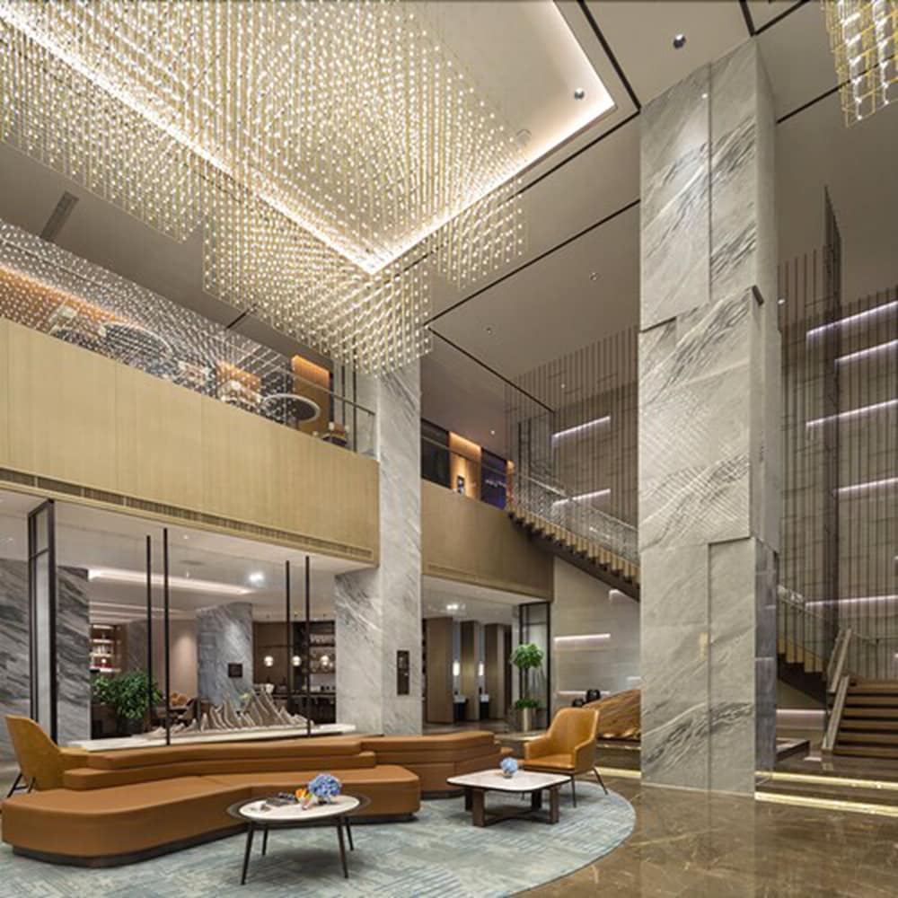 Фото New Century Hotel Zhenhai