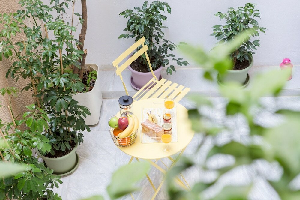 Фото Grandma's Chic & Bright Athenian Home with a Patio