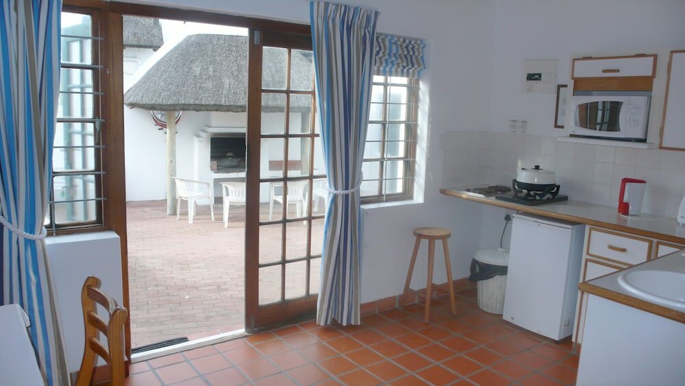 Фото Arniston Seaside Cottages