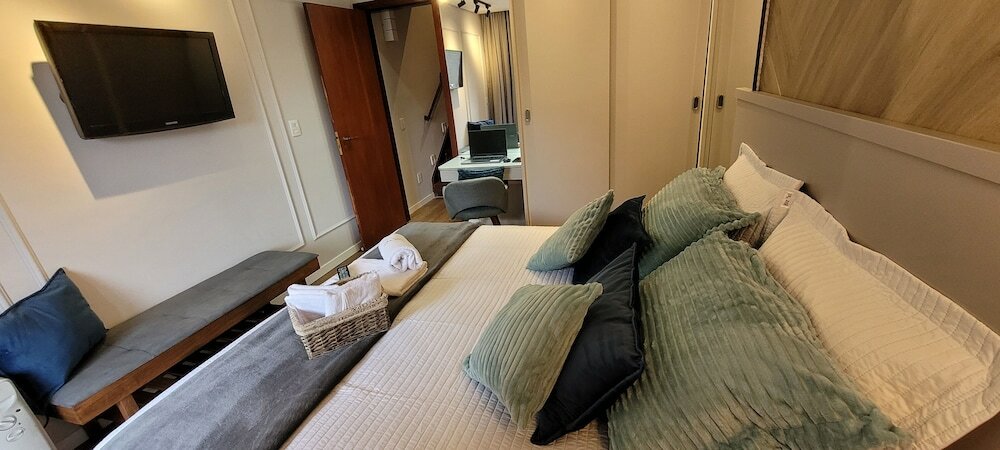 Фото Dúplex Luxo com Piscina Aquecida, Lareira e Wifi