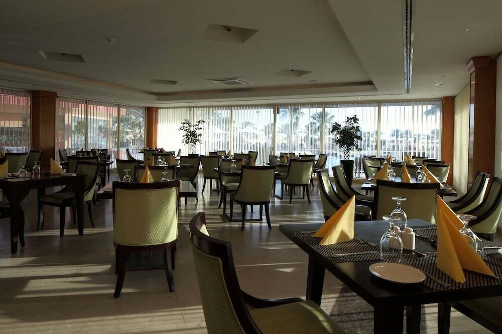 Фото Mena Holiday Beach Resort Half Moon Bay