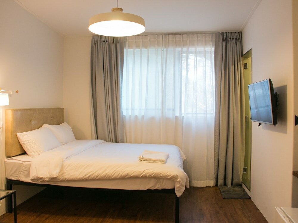 Фото Hi Jun Guesthouse