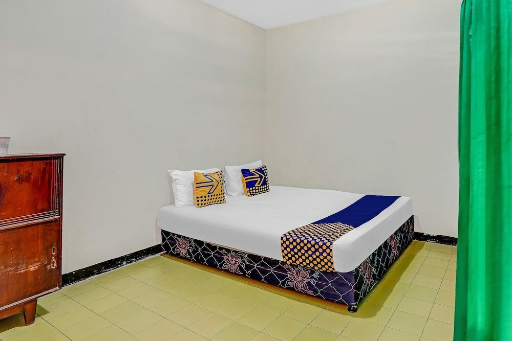 Фото Spot On 90098 Anak Mama Guesthouse