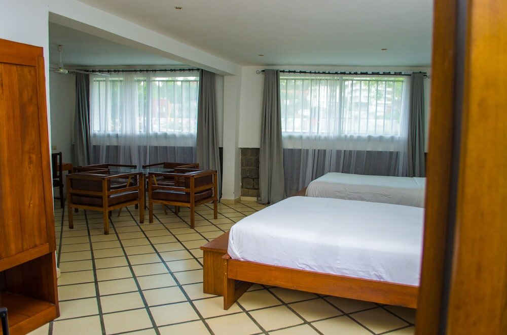 Фото Ikopa Hôtel