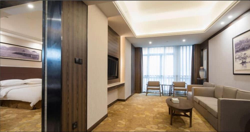 Фото Auden International Hotel