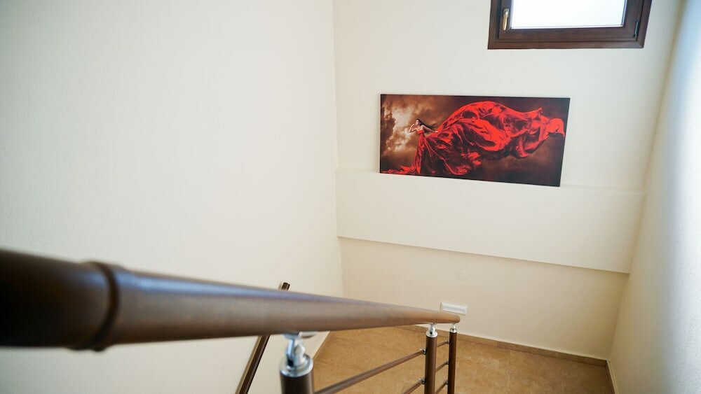 Фото Sinodinos Deluxe Apartments