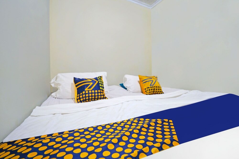 Фото Spot On 91783 Urban Syariah Residence