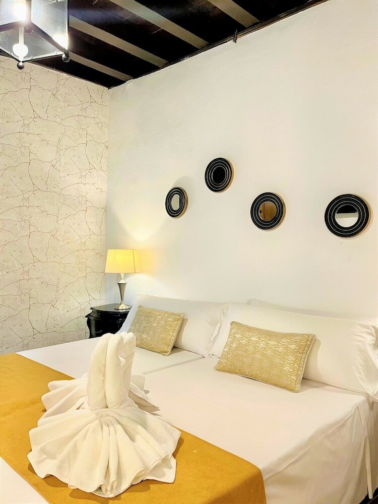 Фото Suites Casa De Las Columnas