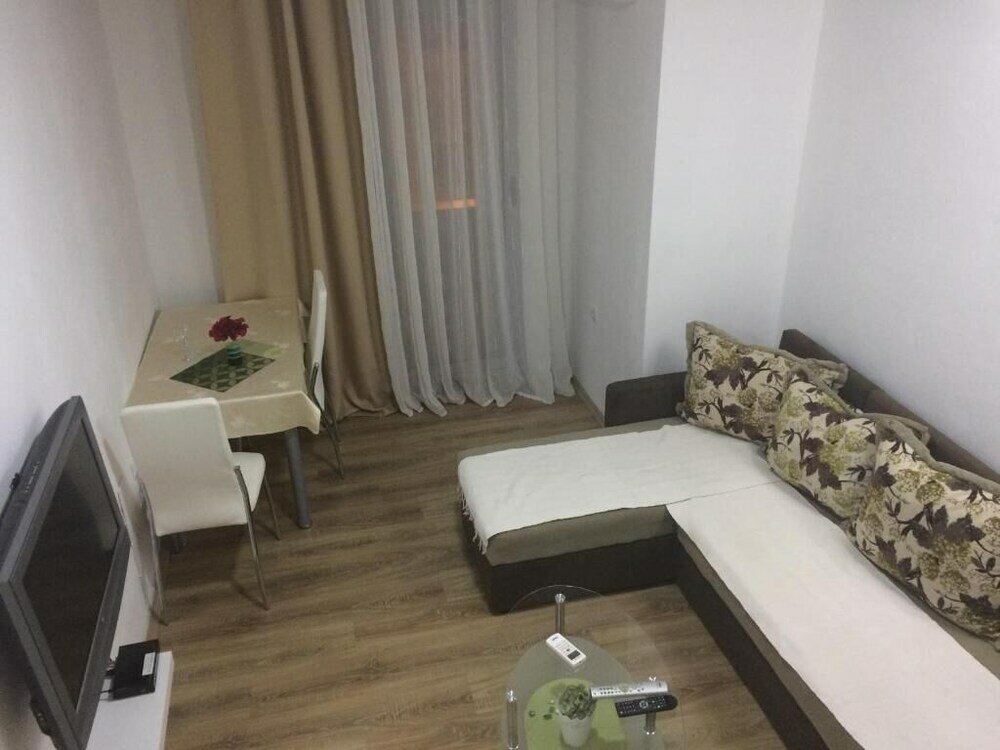 Фото La Porta Apartments