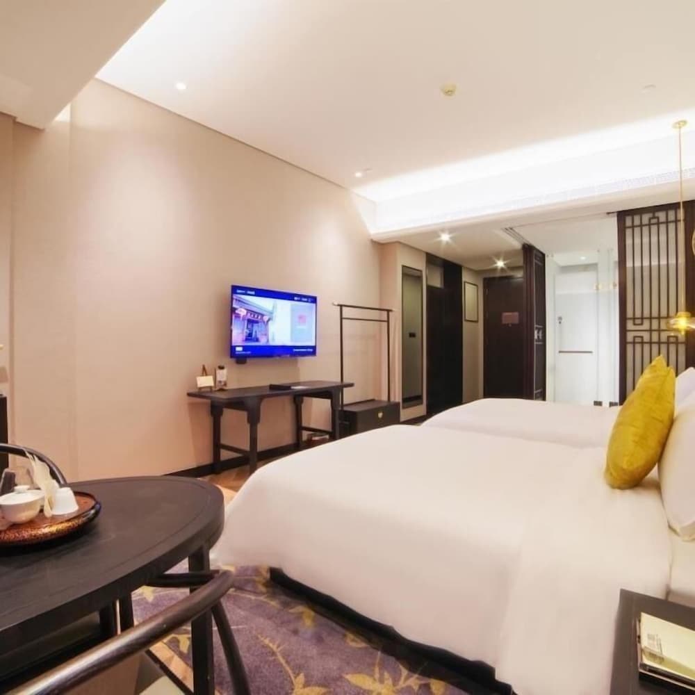 Фото Sanfang Qixiang Shuxiang Wenru Hotel