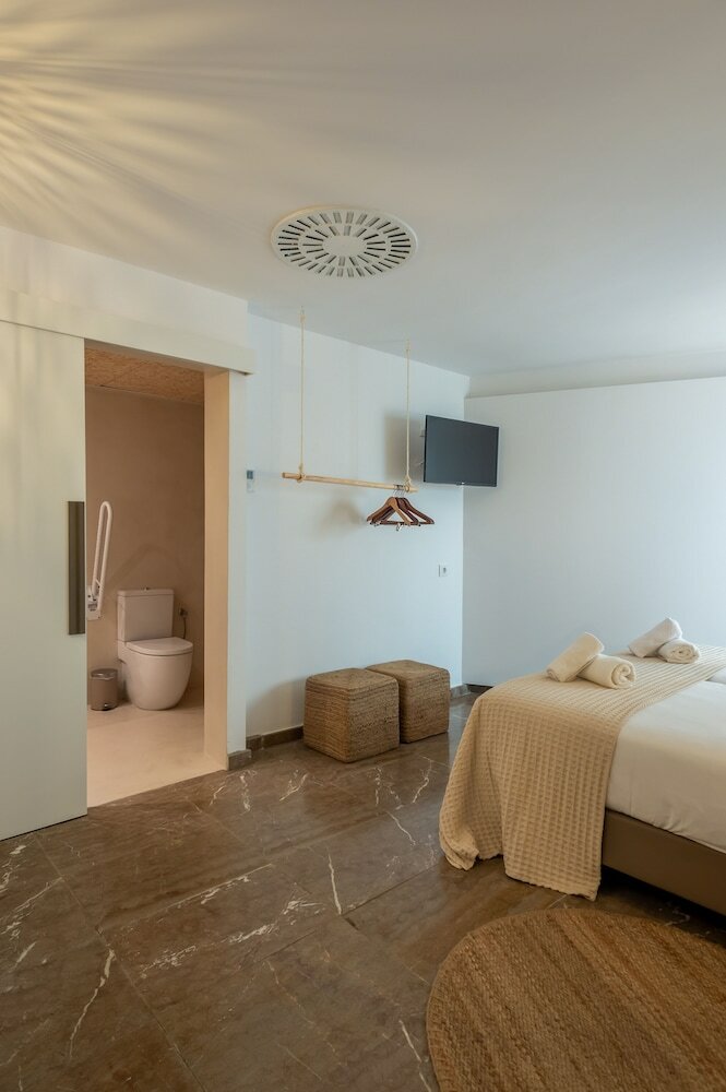 Фото Hostal Es Niu de Tamariu