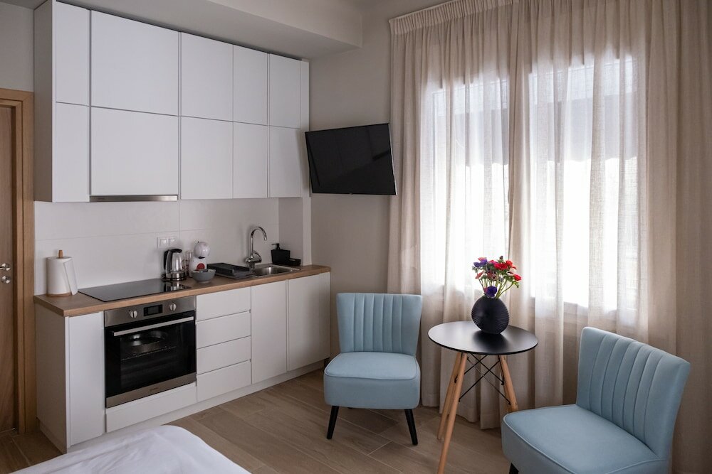 Фото Elia Didotou City Apartments