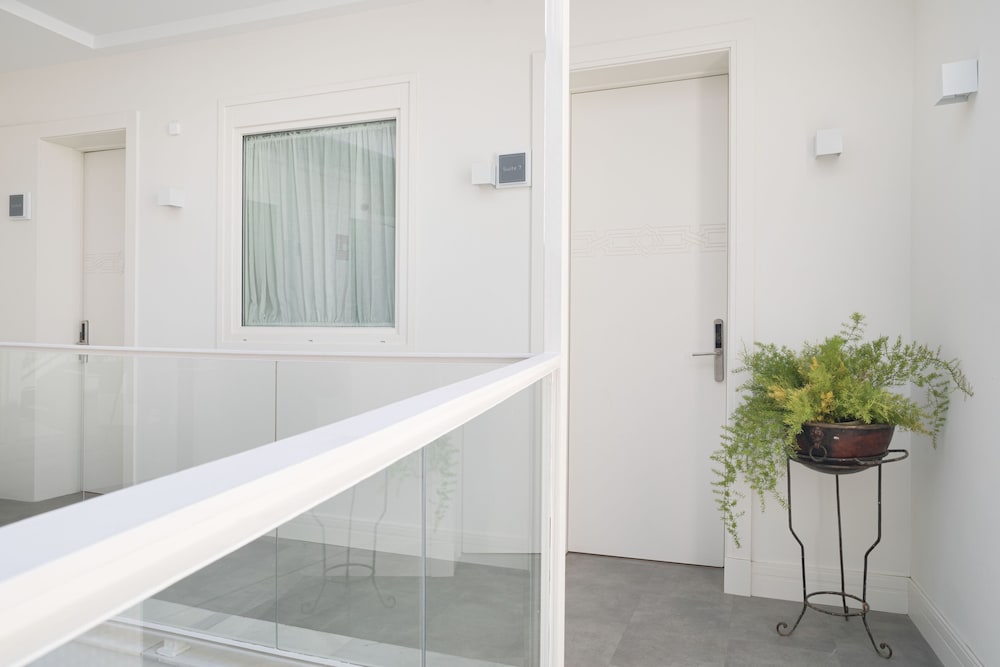 Фото Mylu Suites by Puerta Catedral