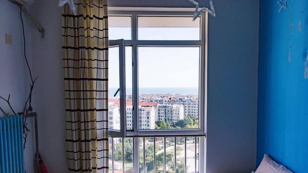 Фото Qingdao Bobo House Sea View Lodge