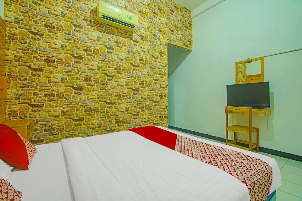 Фото Oyo 91730 De' Mande Homestay Syariah