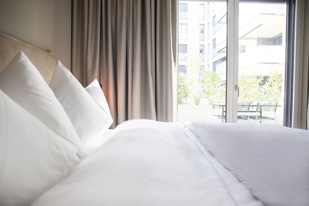 Фото Gubelhof Suites