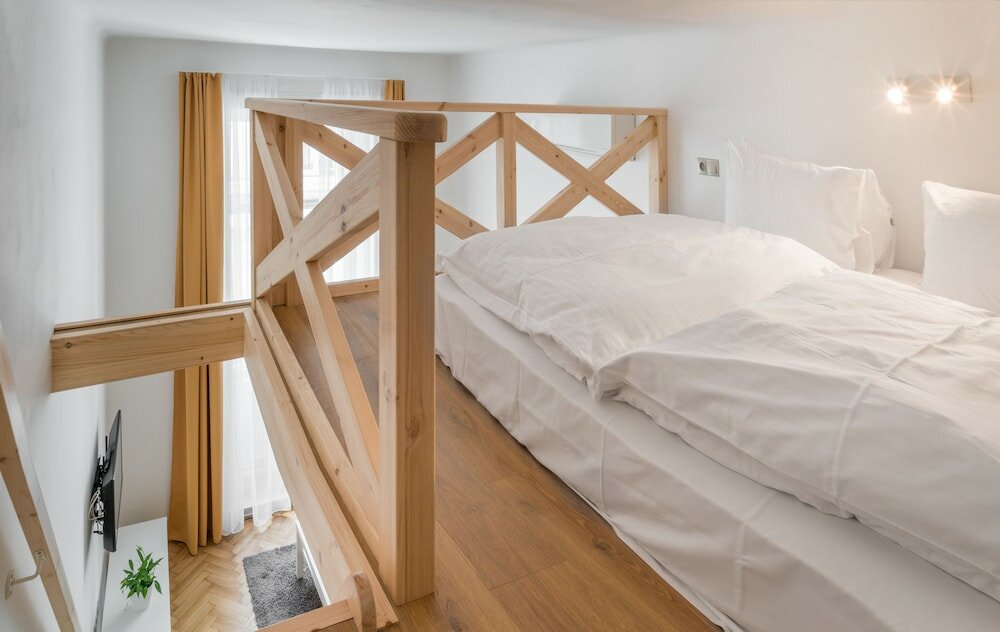 Фото Mordecai Twelve Apartments by Adrez Living