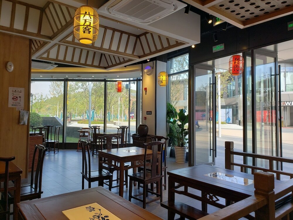 Фото Suzhou Yi Tang Service Apartment