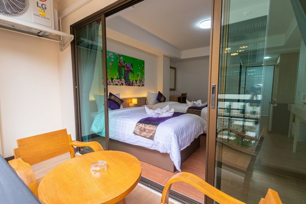 Фото Peacock De Pai Hotel