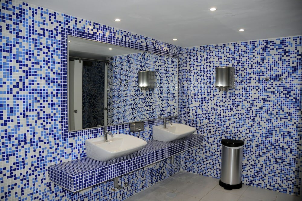 Фото Residencial La Quinta Park Suites