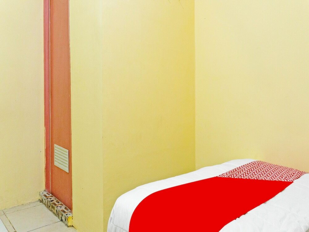 Фото Spot On 91402 Home'59 Tegal Danas