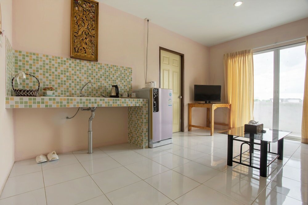 Фото Oyo 75356 Thipsiri Lodge