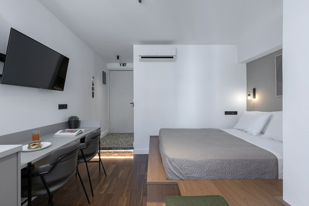 Фото The Athenians Art Apartments