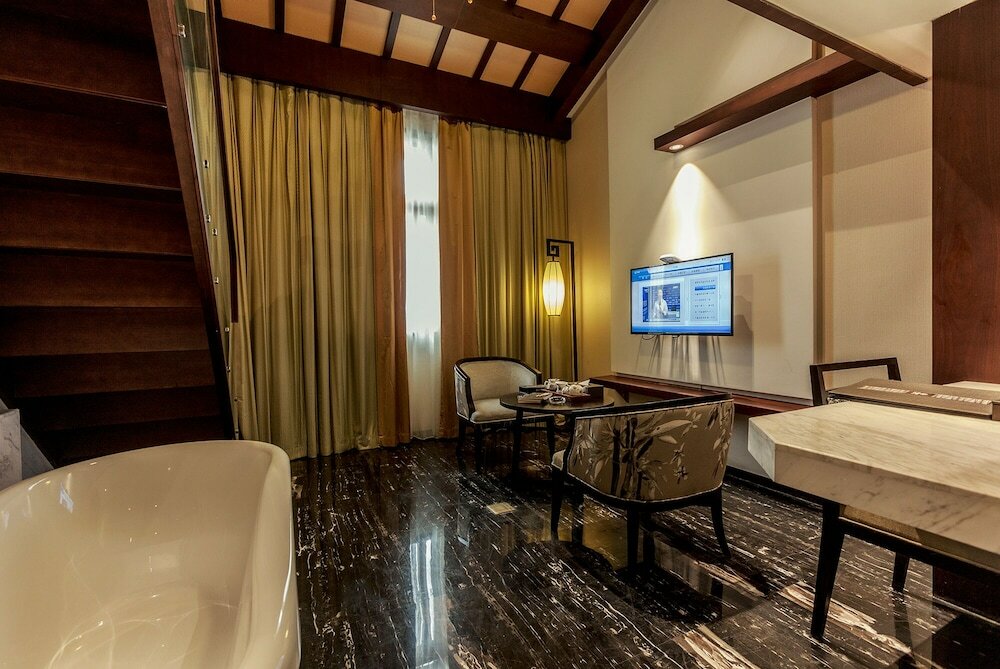 Фото Hejing Chengshang Generations Hotel